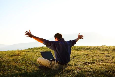 man outside with computer